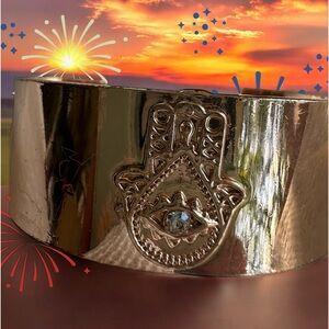 Copper tone cuff bracelet With the all seeing eye to look over you